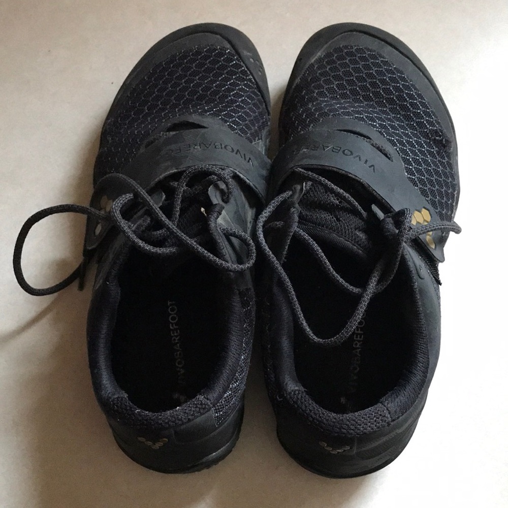 Vivobarefoot black and gold tennis shoes